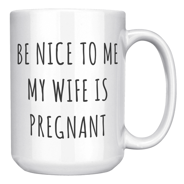 Be_Nice_to_Me_My_Wife_is_Pregnant_Mug_Ex_15oz_White_RH_Mockup.png