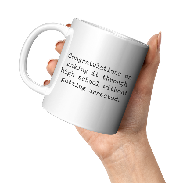 High_School_Graduation_Gifts_Funny_Gradu_11oz_White_LH_Model_Mockup.png
