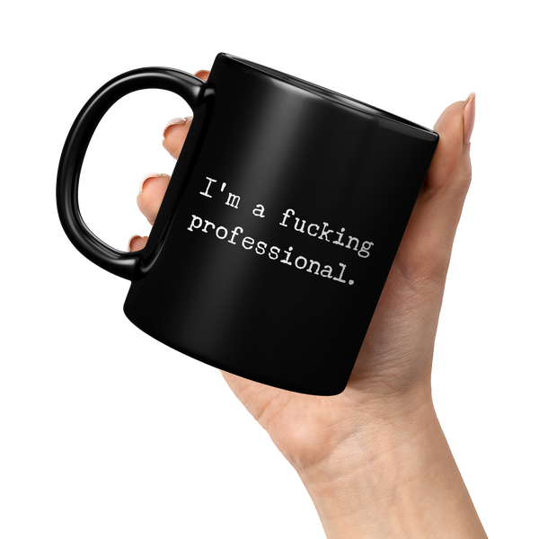 Im_a_Fucking_Professional_Black_Ceramic_11oz_Black_LH_Model_Mockup.png