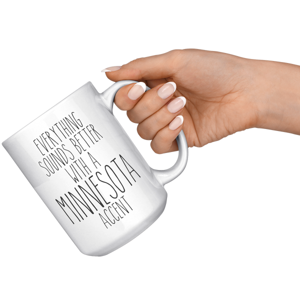 Minnesotan_Mug_Everything_Sounds_Better__15oz_White_RH_Model_Mockup.png