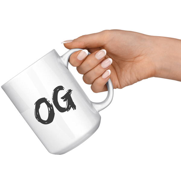 OG_Coffee_Mug_White_RH_Model_Mockup.png