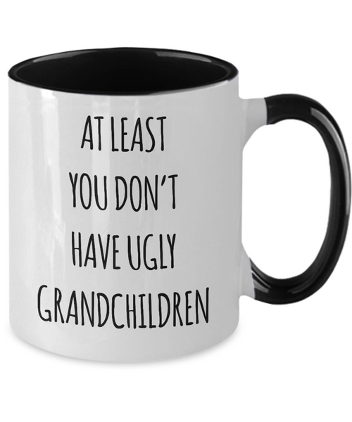 To Grandma At Least You Don't Have Ugly Grandchildren Two-Tone Mug Coffee Cup Funny Gift