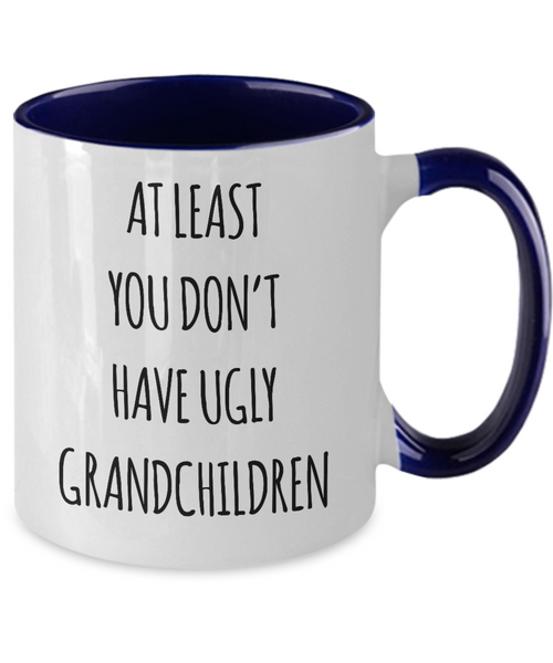To Grandma At Least You Don't Have Ugly Grandchildren Two-Tone Mug Coffee Cup Funny Gift